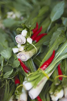 Spring onions and chillies at market, Phnom Penh, Cambodia Spring onions and chillies at market, Phnom Penh, Cambodia
