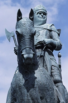 Prints of The statue of Robert the Bruce, at the Bruce Monument at Bannockburn. This commemorates his 1314 victory over the English Related Prints: Print of Robert the Bruce Statue at Bannockburn Monument