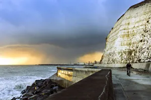 Storm clouds over the English Channel near Brighton with the white cliffs of Peacehaven Storm clouds over the English Channel near Brighton with the white cliffs of Peacehaven