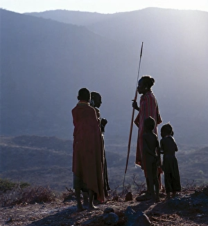 As the sun rises above the forested peaks of Mount Nyiru As the sun rises above the forested peaks of Mount Nyiru