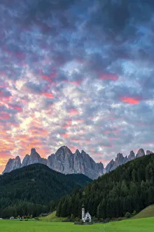 Sunrise in San Giovanni in Ranui in Funes valley. Europe, Italy, Bolzano province Sunrise in San Giovanni in Ranui in Funes valley. Europe, Italy, Bolzano province
