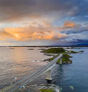 Sunset over Storseisundet Bridge on the Atlantic Road, aerial view Sunset over Storseisundet Bridge on the Atlantic Road, aerial view