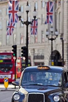 Taxi on Regent Street, London, England, UK Taxi on Regent Street, London, England, UK