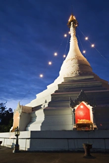 Thailand, Mae Hong Son, Mae Hong Son. Chedi at Wat Phra That Doi Kong Mu illuminated at night Thailand, Mae Hong Son, Mae Hong Son. Chedi at Wat Phra That Doi Kong Mu illuminated at night