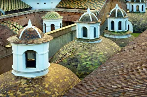 Tiled Cupolas Seperate The Rooftops of The Metropolitan Cathedral and Iglesia El Sagrario Tiled Cupolas Seperate The Rooftops of The Metropolitan Cathedral and Iglesia El Sagrario