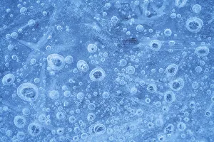 Tiny ice bubbles along the shore of a frozen lake in the Apuan Alps, Tuscany, Italy Tiny ice bubbles along the shore of a frozen lake in the Apuan Alps, Tuscany, Italy