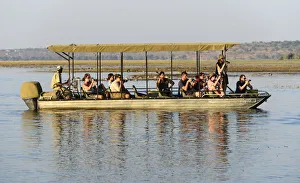 Tour boat on Chobe River near Kasane, Chobe National Park, Botswana, Africa Tour boat on Chobe River near Kasane, Chobe National Park, Botswana, Africa