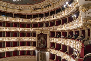 Tourists admiring the Interior of Teatro Regio. Parma, Emilia Romagna, Italy Tourists admiring the Interior of Teatro Regio. Parma, Emilia Romagna, Italy