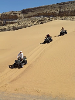 Tourists set out on quad bikes to explore the magnificent Tourists set out on quad bikes to explore the magnificent