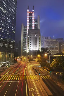 Traffic passing along Queens Road Central with HSBC building in background, Central Traffic passing along Queens Road Central with HSBC building in background, Central