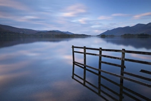 Tranquil Derwent Water at dusk, Lake District, Cumbria, England. Autumn (October) Tranquil Derwent Water at dusk, Lake District, Cumbria, England. Autumn (October)