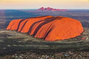 Australia Collection: Uluru and Kata Tjuta at sunrise, Aerial view. Northern Territory, Australia