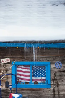 USA, Colorado, Telluride, US Flag in window USA, Colorado, Telluride, US Flag in window