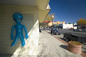 USA, New Mexico, Roswell, Alien in shop doorway USA, New Mexico, Roswell, Alien in shop doorway
