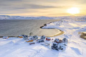 Finland Collection: Veines village covered with snow lit by sunrise, Kongsfjord, Varanger Peninsula