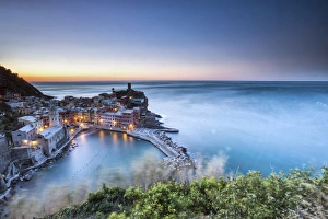Vernazza and its harbor in a winter night from a lookout along a path in the Cinque Vernazza and its harbor in a winter night from a lookout along a path in the Cinque