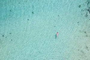 a vertical shot with beautiful girl enjoying the sea, Black River, Mauritius a vertical shot with beautiful girl enjoying the sea, Black River, Mauritius