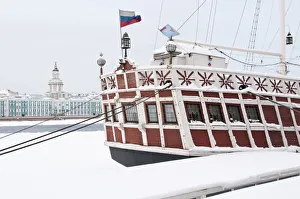 Vessel on the Neva River with The Kunstkammer museum in the background, Saint Petersburg Vessel on the Neva River with The Kunstkammer museum in the background, Saint Petersburg
