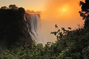 Victoria Falls at sunrise, Zambezi River, near Victoria Falls, Zimbabwe, Africa Victoria Falls at sunrise, Zambezi River, near Victoria Falls, Zimbabwe, Africa