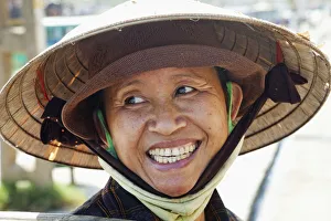 Vietnam, Hoi An, Portrait of Lady Wearing Conical Hat Vietnam, Hoi An, Portrait of Lady Wearing Conical Hat