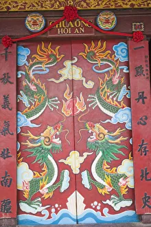 Vietnam, Hoi An, Quan Cong Temple, Entrance Doorway depicting Dragons Vietnam, Hoi An, Quan Cong Temple, Entrance Doorway depicting Dragons