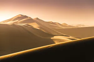 Walvis Bay, Namibia, Africa. Tourist. Sand dunes at sunset Walvis Bay, Namibia, Africa. Tourist. Sand dunes at sunset