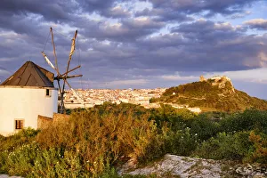 Windmill at the Serra do Louro and the castle of Palmela. Arrabida Nature Park, Palmela Windmill at the Serra do Louro and the castle of Palmela. Arrabida Nature Park, Palmela