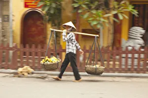 Woman street vendor, Old Quarter, Hanoi, Vietnam Woman street vendor, Old Quarter, Hanoi, Vietnam