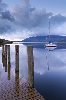 Yacht moored near Lodore boat launch on Derwent Water, Lake District, Cumbria, England Yacht moored near Lodore boat launch on Derwent Water, Lake District, Cumbria, England