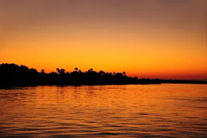 Zambezi River at sunset, near Victoria Falls, Zimbabwe, Africa Zambezi River at sunset, near Victoria Falls, Zimbabwe, Africa