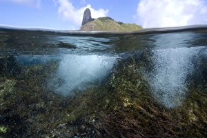 Fernando De Noronha Island Prints: Morro do pico and wave breaking over reef