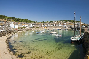 The pretty fishing village of Mousehole near Newlyn in Cornwall, UK The pretty fishing village of Mousehole near Newlyn in Cornwall, UK