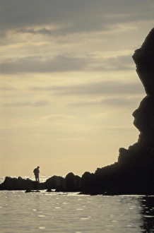 Silhouette of fisherman, Porthlysgi Bay, Pembrokeshire, Wales, UK, Europe (rr) Silhouette of fisherman, Porthlysgi Bay, Pembrokeshire, Wales, UK, Europe (rr)