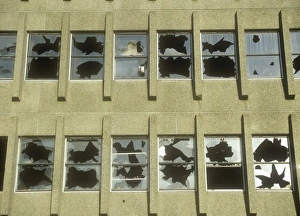 Ashley Cooper Photographer UK Prints: Smashed windows in a derelict building in oldham, lancashire, UK