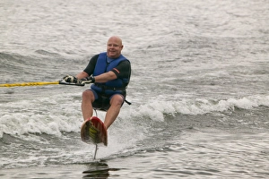Waterskiers on Lake Windermere in the Lake District UK Waterskiers on Lake Windermere in the Lake District UK