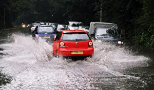 Cars driving through flash floods in Sevenoaks Kent Cars driving through flash floods in Sevenoaks Kent