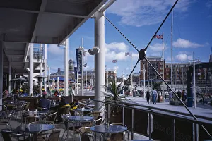ENGLAND Hampshire Portsmouth Gunwharf Quay Shopping Centre Outside Cafe with view across ENGLAND Hampshire Portsmouth Gunwharf Quay Shopping Centre Outside Cafe with view across