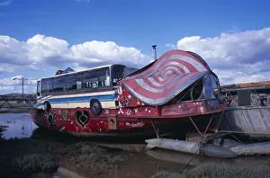 ENGLAND West Sussex Shoreham by Sea Colourful houseboat fabricated with various bus ENGLAND West Sussex Shoreham by Sea Colourful houseboat fabricated with various bus