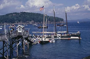 USA, Maine, Bar Harbour Wooden jetty with yacht moored at side USA, Maine, Bar Harbour Wooden jetty with yacht moored at side