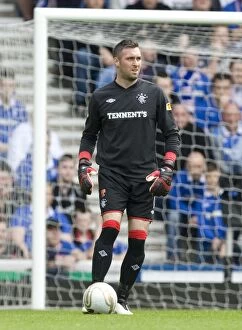Images Dated 24th April 2011: A Battle at Ibrox: Allan McGregor's Determined Standoff - Rangers vs Celtic (0-0)