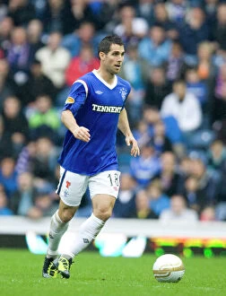 Images Dated 1st October 2011: Carlos Bocanegra Scores the Winning Goal for Rangers against Hibernian at Ibrox Stadium