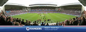 Club legend Sandy Jardine walks out to a packed Ibrox and unfurls the 2012/13 SFL 3 CHAMPIONS FLAG Club legend Sandy Jardine walks out to a packed Ibrox and unfurls the 2012/13 SFL 3 CHAMPIONS FLAG