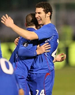 Images Dated 21st February 2008: Rangers Barry Ferguson and Carlos Cuellar Celebrate Dramatic UEFA Cup Draw Against Panathinaikos