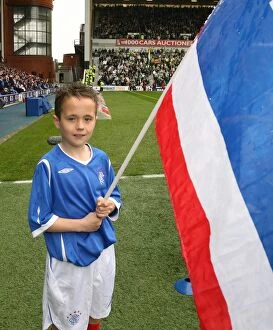 Images Dated 9th May 2009: Rangers Flag Bearers Triumph: Celebrating Historic 1-0 Victory over Celtic at Ibrox