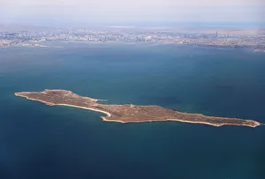 An aerial view of the Caspian Sea near the city of Baku is pictured through the window of An aerial view of the Caspian Sea near the city of Baku is pictured through the window of