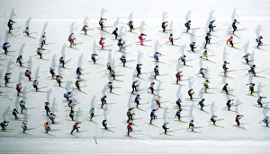 An aerial view of cross country skiers racing over the frozen lake Sils during the An aerial view of cross country skiers racing over the frozen lake Sils during the