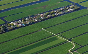 Aerial view of houses surrounded by water near Amsterdam Aerial view of houses surrounded by water near Amsterdam