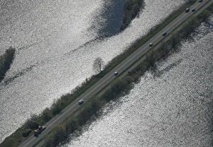 Aerial view of a road surrounded by water near Amsterdam Aerial view of a road surrounded by water near Amsterdam
