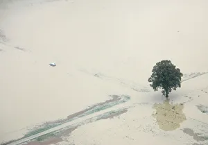 An aerial view shows a blockd car near the flooded airport Berne Belpmoss An aerial view shows a blockd car near the flooded airport Berne Belpmoss