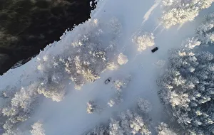 An aerial view shows cars driving along a bank of the Yenisei River outside Krasnoyarsk An aerial view shows cars driving along a bank of the Yenisei River outside Krasnoyarsk